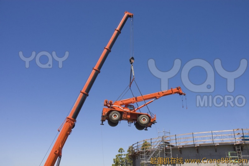 very-large-crane-lifting-small-crane-89d964.jpg