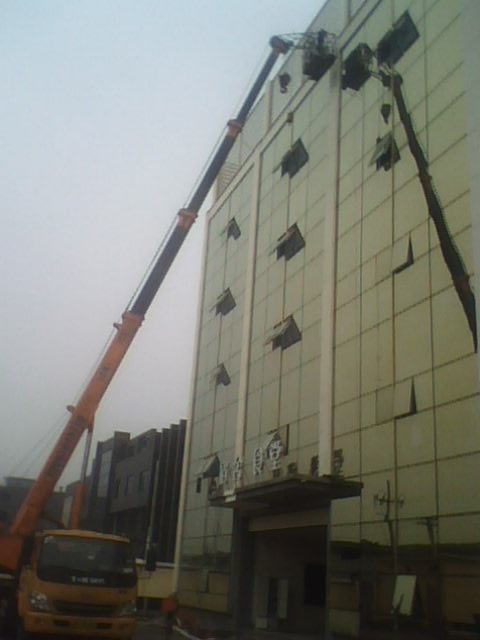 20米高换玻璃